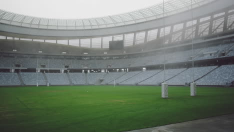 animación de iconos de las redes sociales flotando contra un estadio deportivo vacío