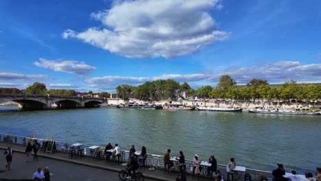 seine river boat paris capital of france with people walking summer day