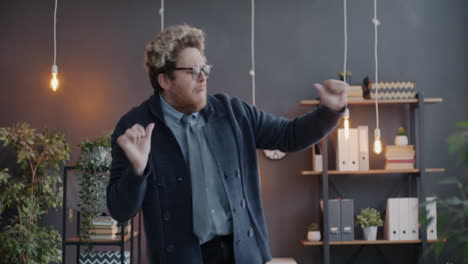 Man Dancing in Office