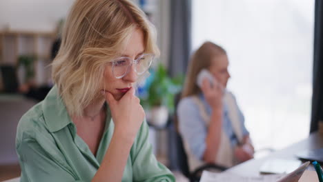 concentrated office worker on laptop and emails