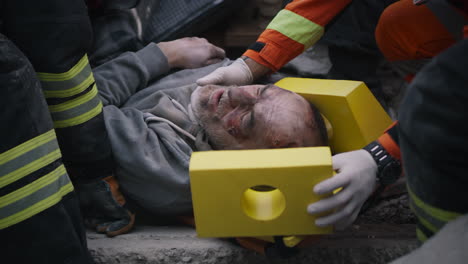 Injured Man Being Rescued from Debris