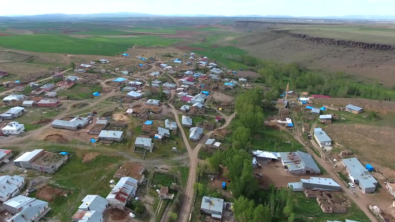 Aerial View of a Small Rural Village in a Valley