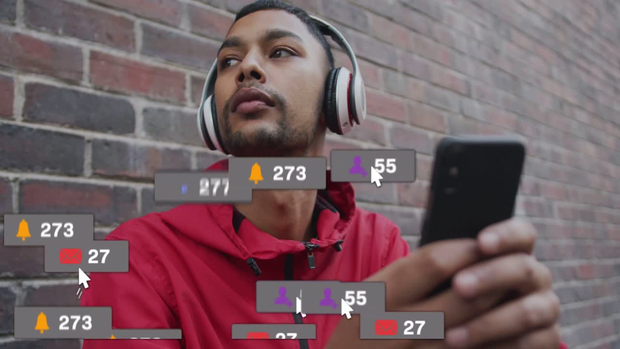 Vertical video: Man holding phone by brick wall, receiving circling alerts above head for marketing