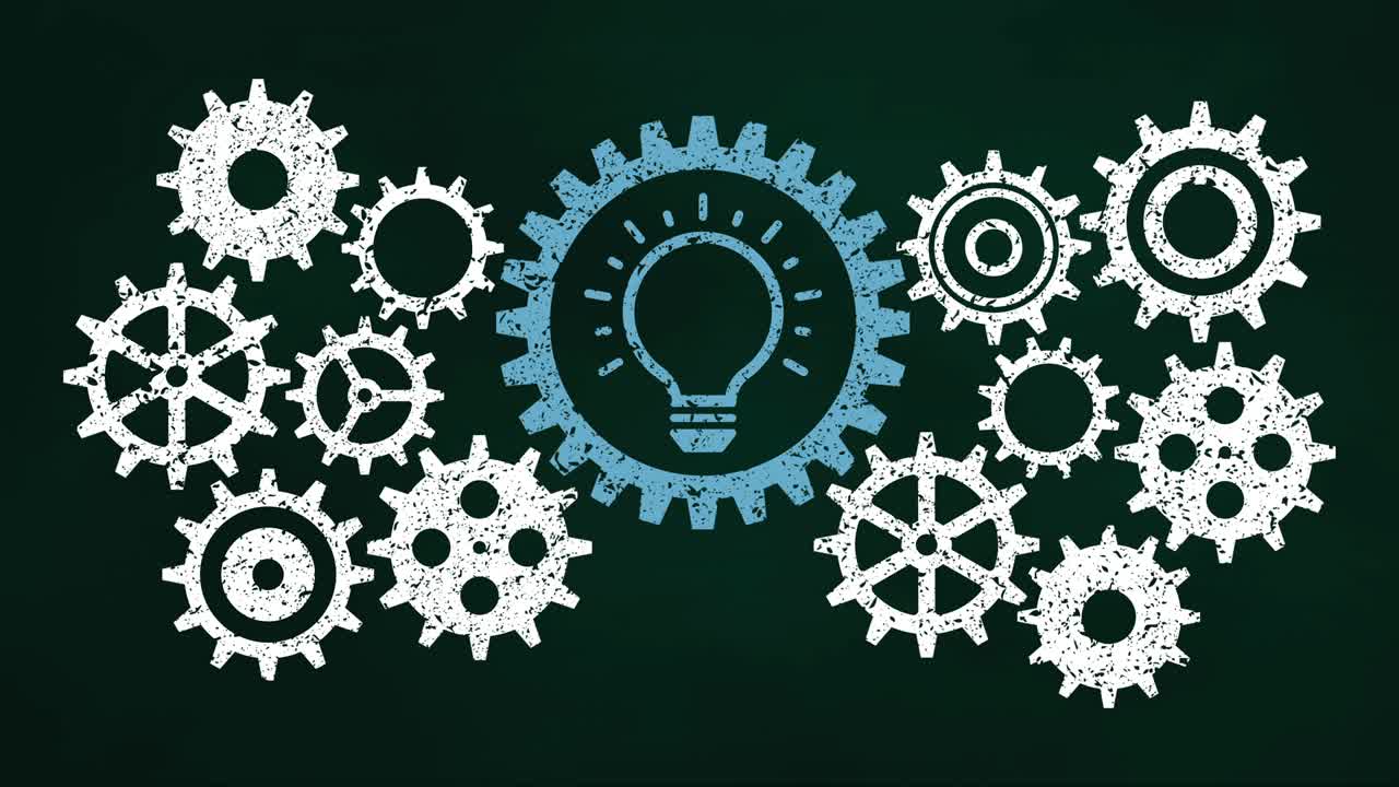 Business gear mechanism concept on chalkboard. Blue light bulb icon.