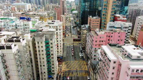 downtown hong kong buildings, crosswalk and traffic, high altitude aerial view