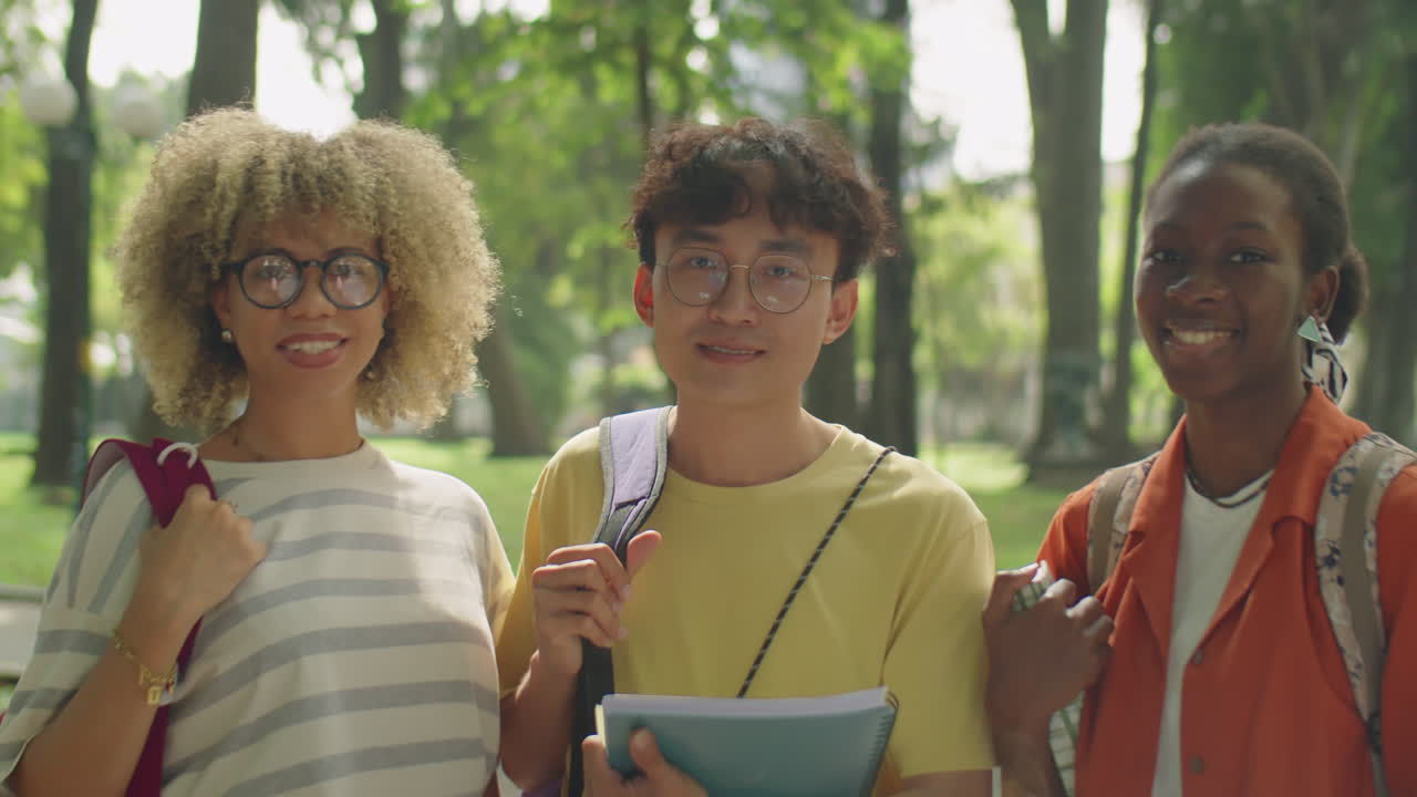 Group Portrait of Diverse College Friends in Park