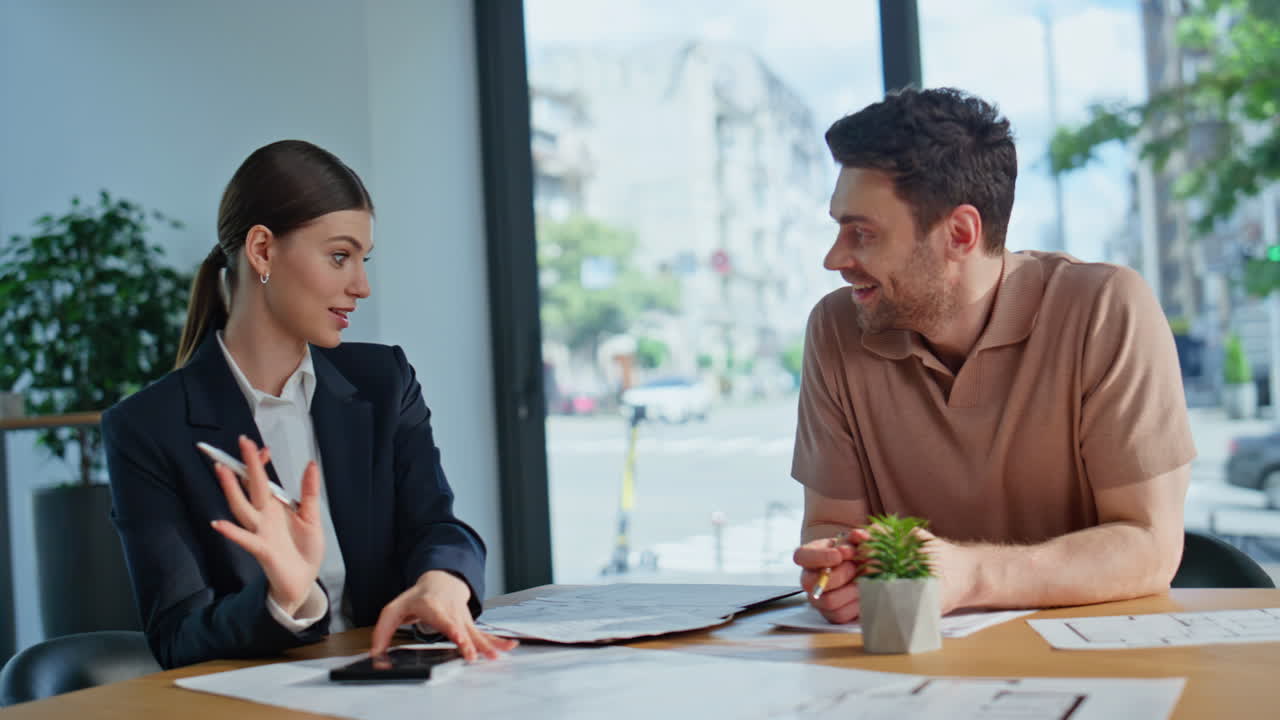 Professionals discussing tax papers at office meeting closeup. Woman calculating