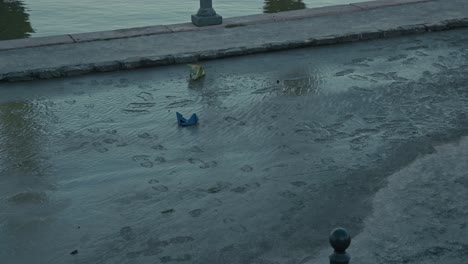 muddy footprints and debris left on the wet street after receding floodwaters during the budapest flood 2024