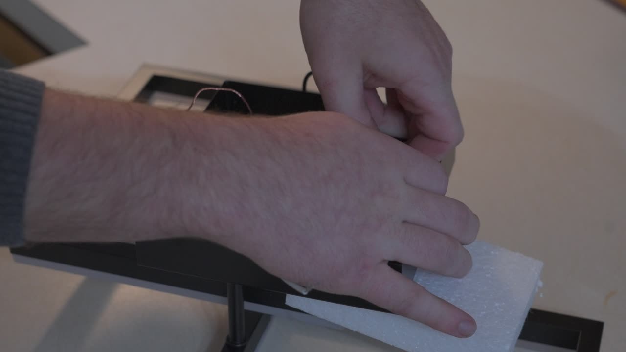 Unwrapping g bundled wires on a new light fixture