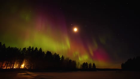 northern lights time lapse 4k video, polar light or aurora borealis in the dark winter night sky over the arctic landscape.