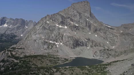 pan left to stunning rocky landscape of lizard head peak in wyoming’s wind river wilderness, with vast mountain views