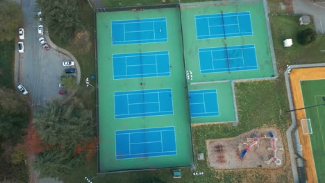 a tennis court and a playground in port coquitlam.