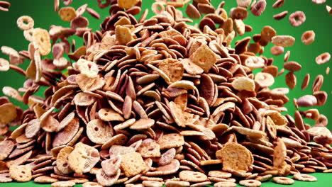 green studio background and cereal pile