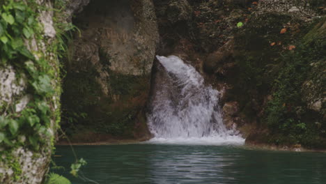 Waterfalls-Splashing-On-Rocky-Hills-In-Mata-de-Maiz-Lake-Near-Polo-In-Barahona-Province,-Dominican-Republic