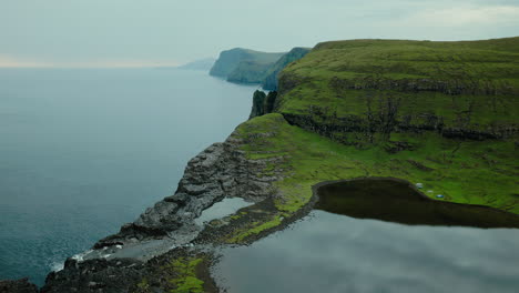 Dramatic Coastal Landscape of Lake Sørvágsvatn Appearing to Float Above the Ocean in Faroe Islands
