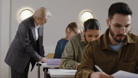 students taking an exam in a classroom