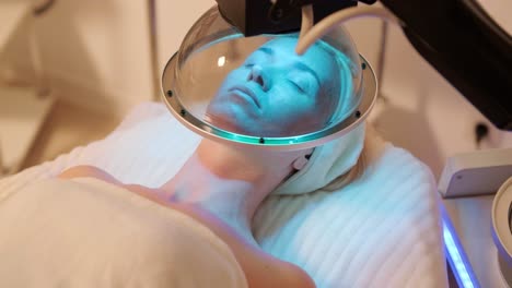 led light facial therapy treatment in the modern cosmetology clinic. professional skin care, moisturizing, rejuvenation. hardware cosmetology