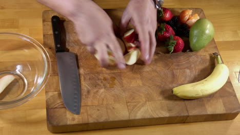 cutting fruit for smoothie