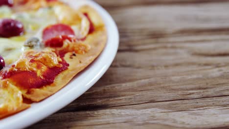 baked pizza on plate