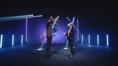 business people demonstrating virtual reality technology at a conference