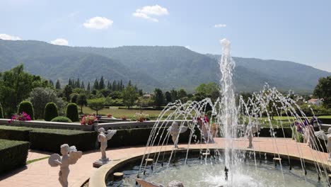 fountain spraying water in a beautiful garden