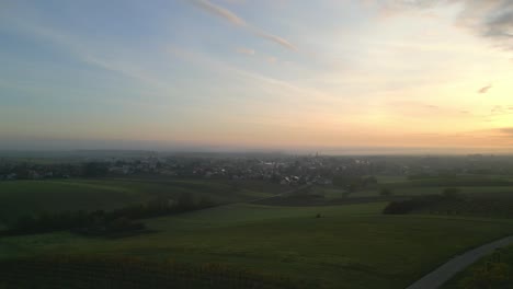 Dramatic-Sunrise-Sky-On-A-Countryside-Village-With-A-Foggy-Atmosphere-In-Lower-Austria