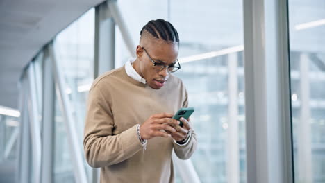 Phone,-surprise-and-black-man-celebrate-in-office