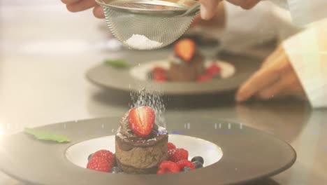 animation of light spots over chefs preparing chocolate dessert