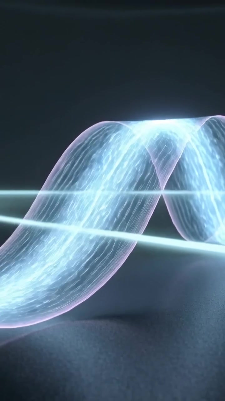 Vertical video: Simulation starting, ribbon moving and looping across beam, showing tech signal