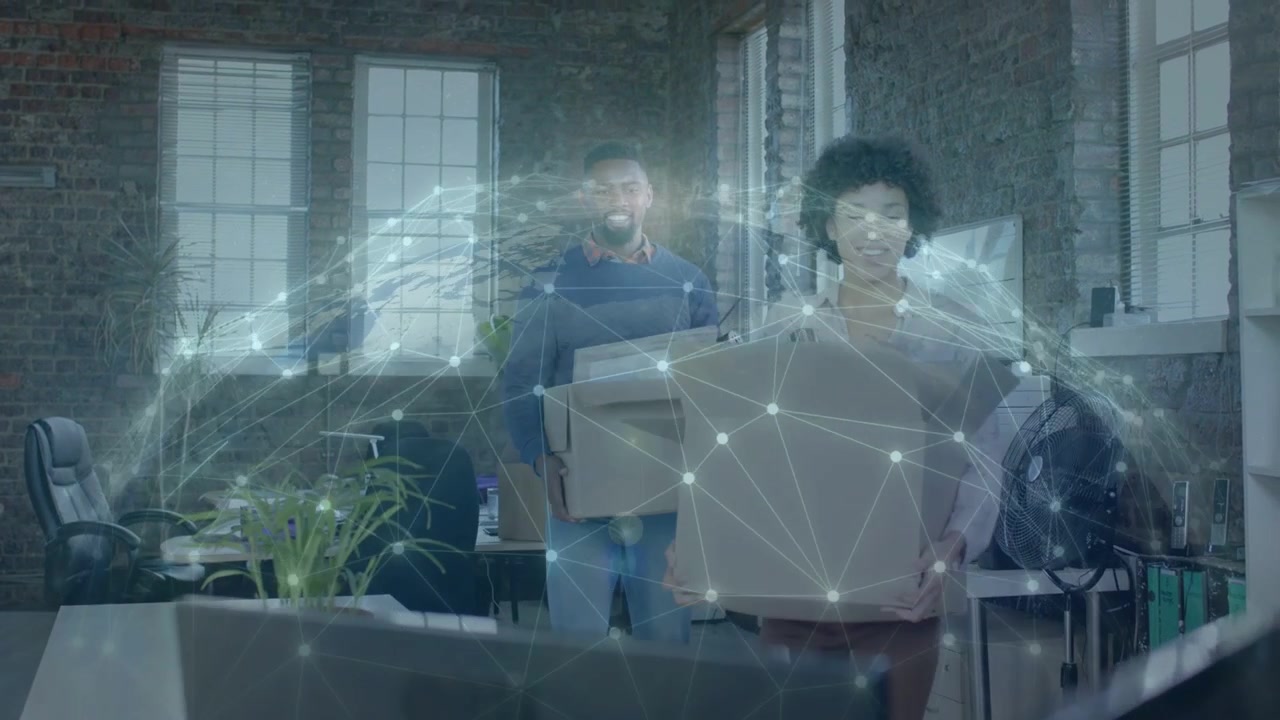 Colleagues carrying boxes through office, animated network halo shifting around them during move