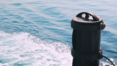 slow motion of ship wake at sea, with taillight part in the frame 120fps