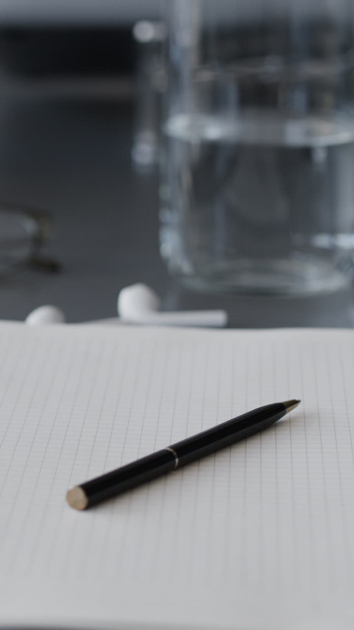 Workspace with Pen and Notebook