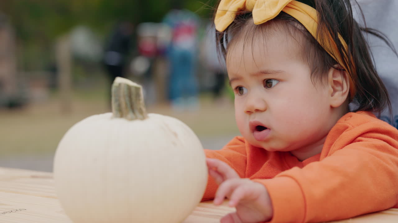 Baby with White Pumpkin
