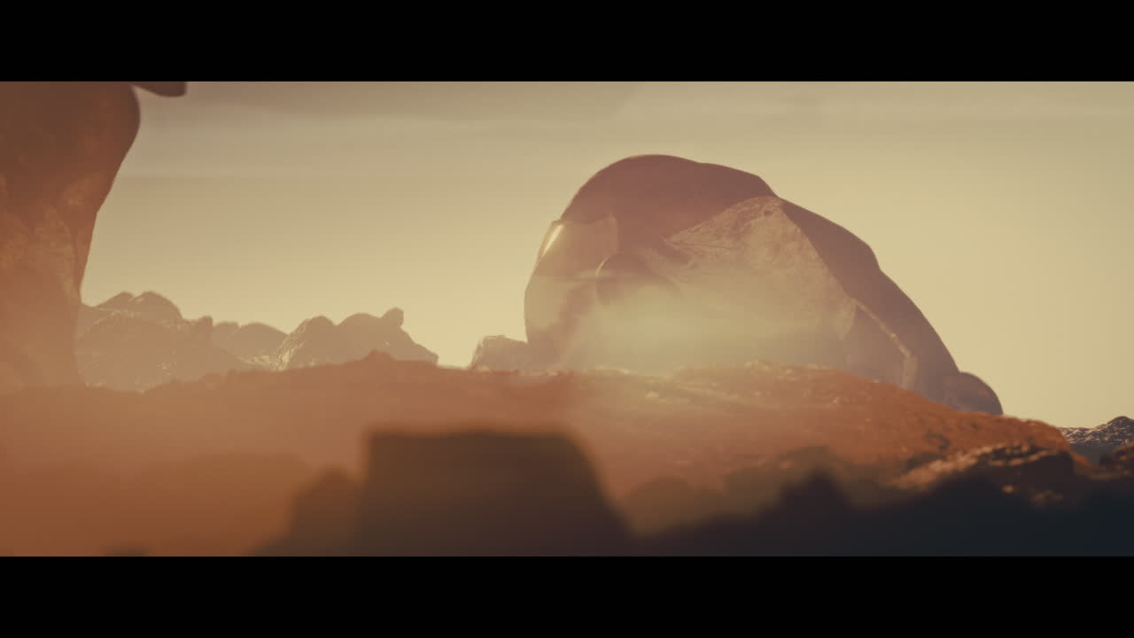 Huge golden statues in the desert during sunset