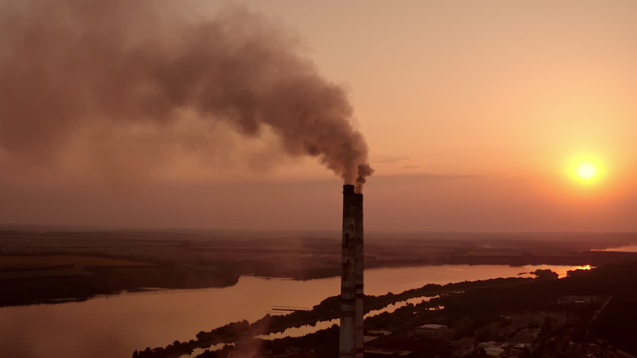Power pylons on sunset time background. High voltage electric tower at the sunset. Fabric concept. Selective focus