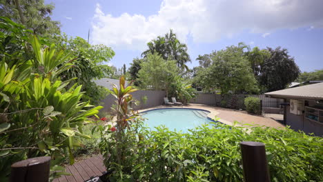 wooden deck and rail to outdoor pool