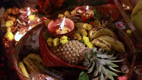 burning oil lamp with offerings during holy rituals at festival from different angle video is taken on the occasions of chhath festival which is used to celebrate in north india on oct 28 2022