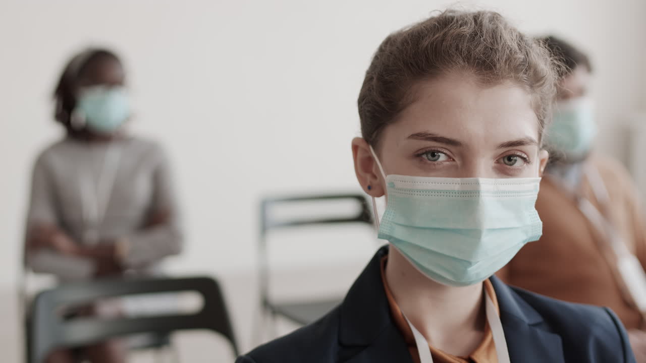 Caucasian Businesswoman in Medical Face Mask