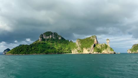 Capture-the-mystique-of-Chicken-Island-in-Krabi,-Thailand,-filmed-under-cloudy-skies