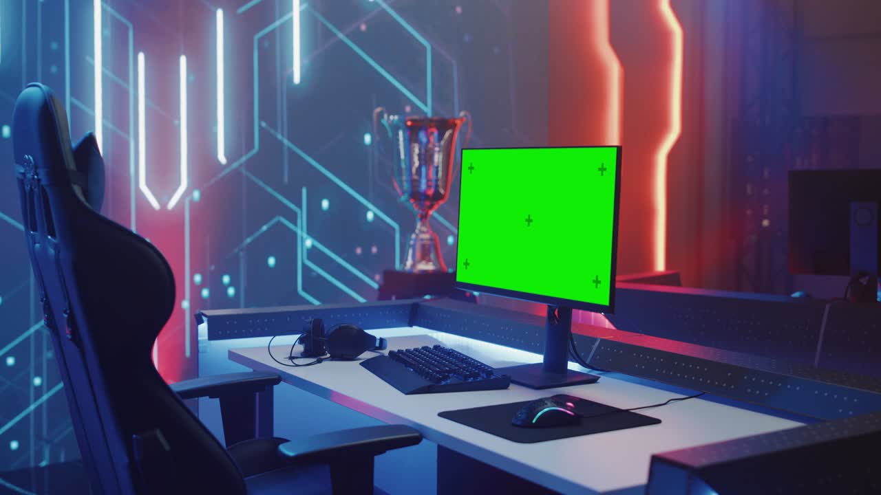 On Cyber Gaming Championship: Empty Gaming Station with Player's Computer Green Chroma Key Screen on Display. Online Cyber Gaming Tournament Live Streaming Event