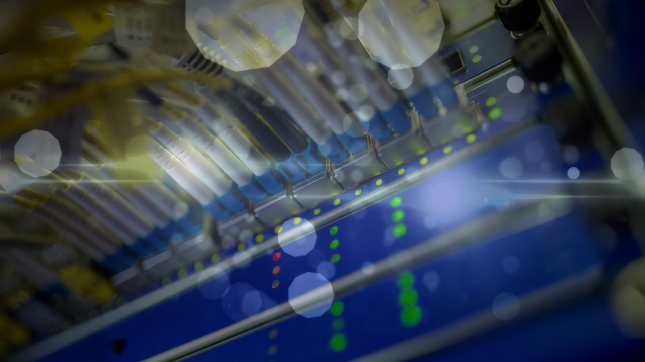 Animation of lights and dots floating over computer wires