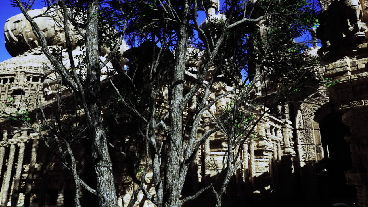 Intricate temple architecture surrounded by lush trees in bright sunlight