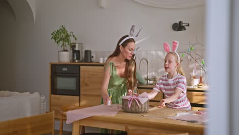 mom and daughter celebrating easter
