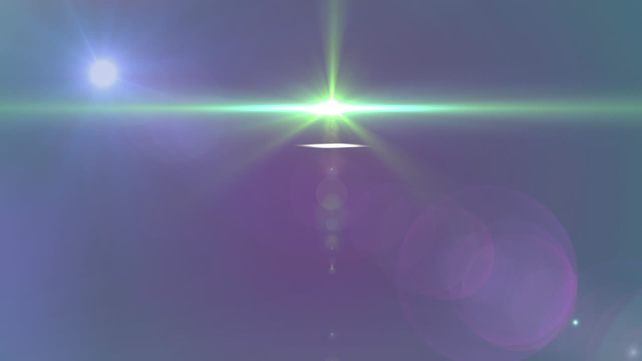 파란색 배경 위에 있는 빛의 반점들의 애니메이션