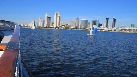 viewing a sailboat from the upper deck of a passenger boat on san diego bay.