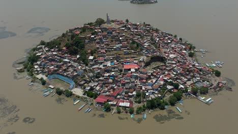 orbit drone shot of janitzio island at mid day in michoacan