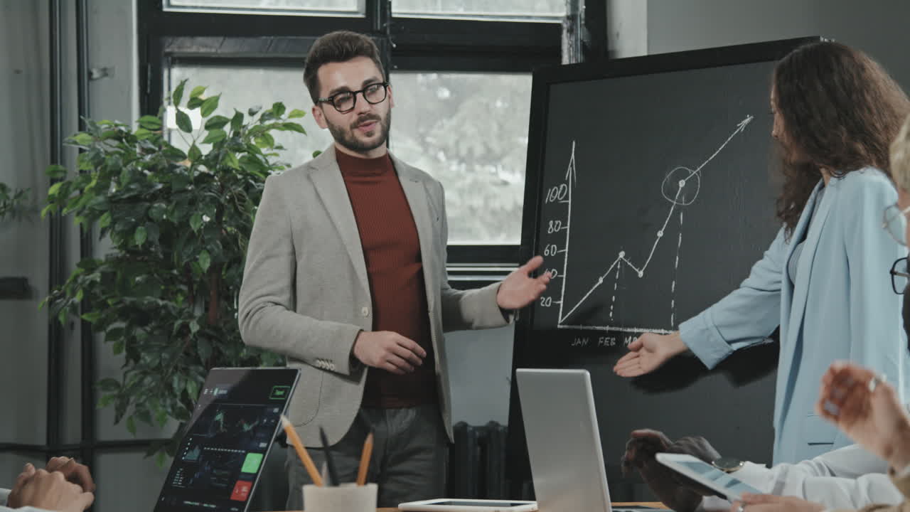 Successful Investors Making Presentation to Business Partners