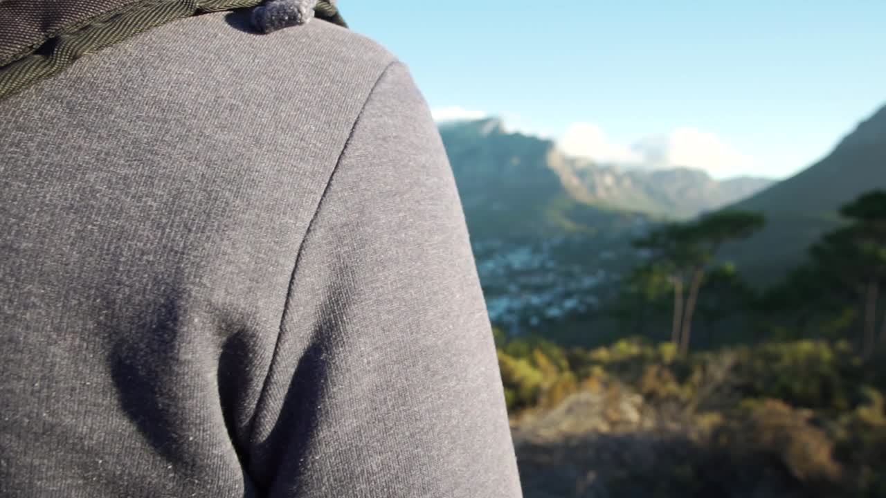 Table Mountain revealed over someones shoulder in Slow Motion