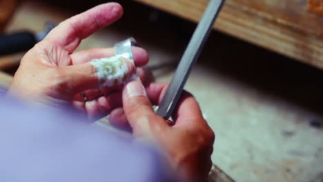 craftswoman preparing ring