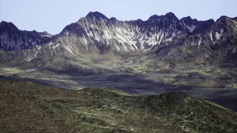 majestic snow capped mountains rise above a serene valley landscape